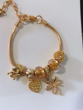 Gold-Tone Charm Bracelet with Amber Glitter Beads and Heart Charm